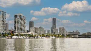 Brisbane skyline and the Story Bridge seen across the Brisbane River on a sunny day